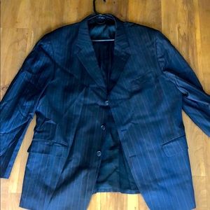 Men’s dark navy suit with white stripe detailing